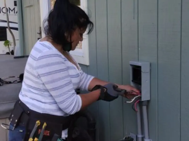 Licensed electrician wiring an exterior subpanel in Maidencreek
