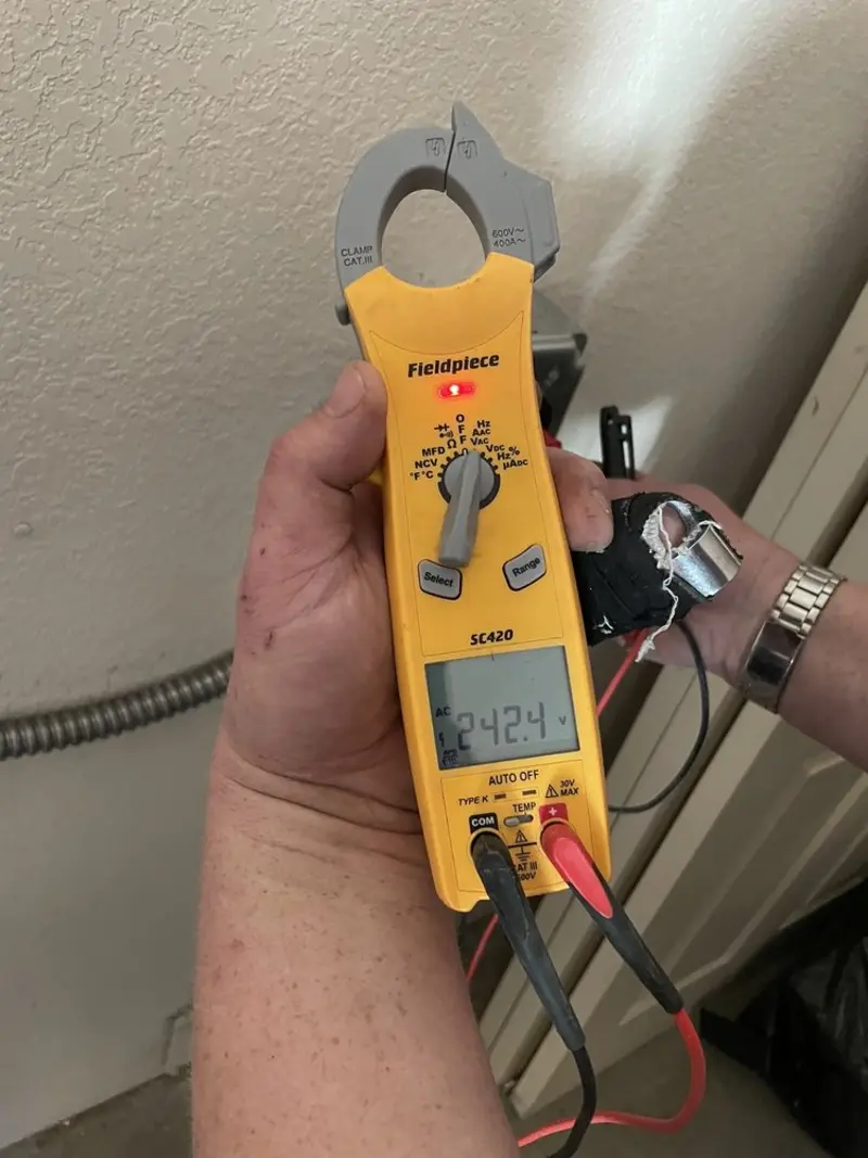 Voltage testing with clamp meter during Electrical Installation Services in Maidencreek